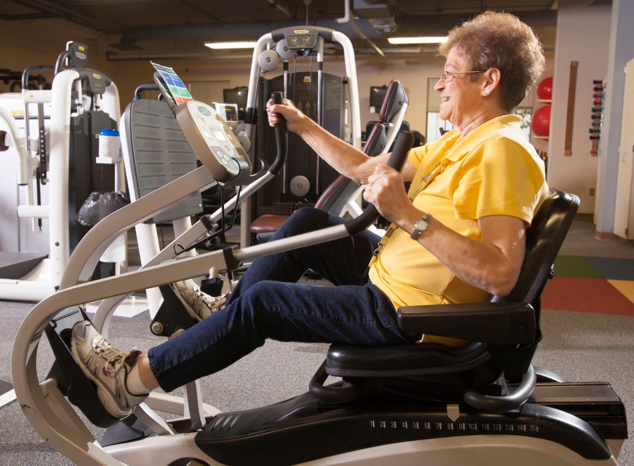 A patient works out in the gym