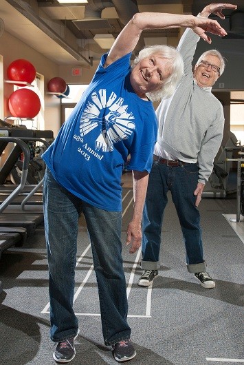 Two individuals recieving out-patient services at CHI St. Francis Health - Physical, Occupational, and Speech Therapy